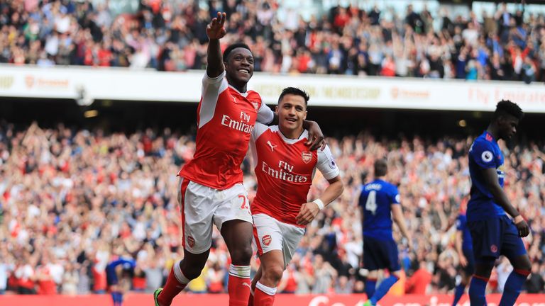 LONDON, ENGLAND - MAY 07:  Danny Welbeck of Arsenal celebrates scoring his sides second goal with Alexis Sanchez of Arsenal during the Premier League match