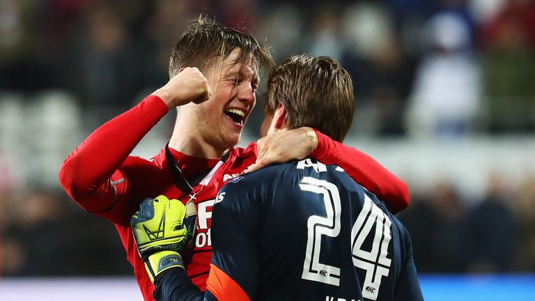 ALKMAAR, NETHERLANDS - MARCH 02:  Tim Krul of AZ Alkmaar celebratres with Wout Weghorst after saving the final penalty in the shoot out to win the Dutch KN