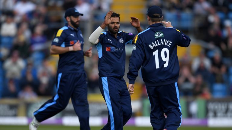 LEEDS, ENGLAND - MAY 01:  Azeem Rafiq of Yorkshire celebrates with teammates after dismissing Karl Brown of Lancashire during the Royal London One-Day Cup 
