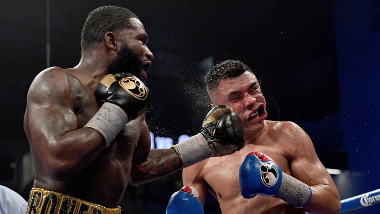 CINCINNATI, OH - FEBRUARY 18:  Adrian Broner, left, hits Adrian Granados during their fight at Centas Center on February 18, 2017 in Cincinnati, Ohio.  (Ph