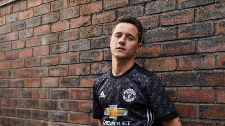 Ander Herrera poses in Manchester United's third kit by adidas