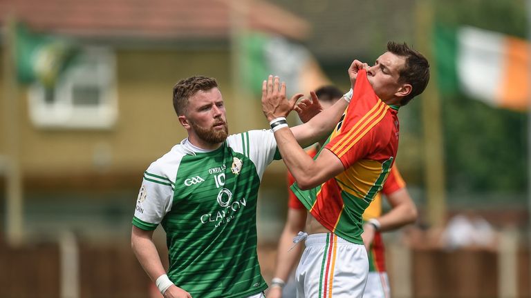 Eoin Murray of London tussles with Sean Gannon of Carlow during the GAA Football All-Ireland Senior Championship Round 1B match between London and Carlow