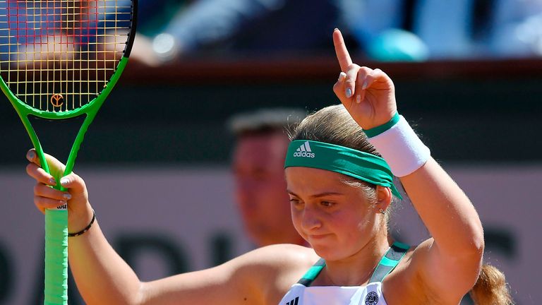 Latvia's Jelena Ostapenko reacts after a point against Romania's Simona Halep during their final tennis match at the Roland Garros 2017 French Open on June