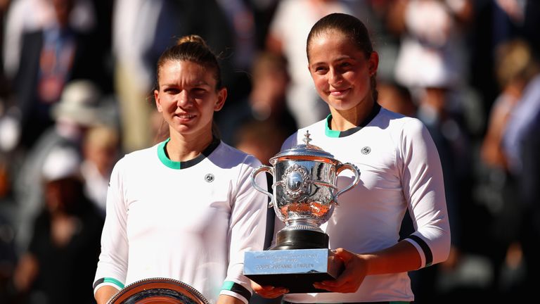 PARIS, FRANCE - JUNE 10:  PARIS, FRANCE - JUNE: Winner, Jelena Ostapenko of Latvia and Runner up, Simona Halep of Romania hold their trophies following the