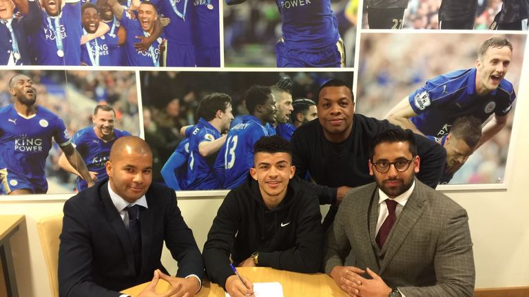 Josh Gordon signing a contract to join Leicester City from Stafford Rangers