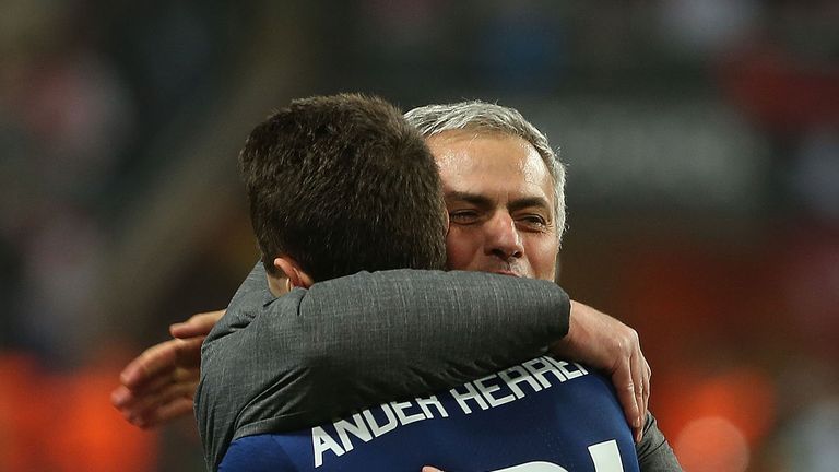 Ander Herrera and Jose Mourinho embrace following Manchester United's Europa League final win over Ajax at Friends Arena on May 24, 2017