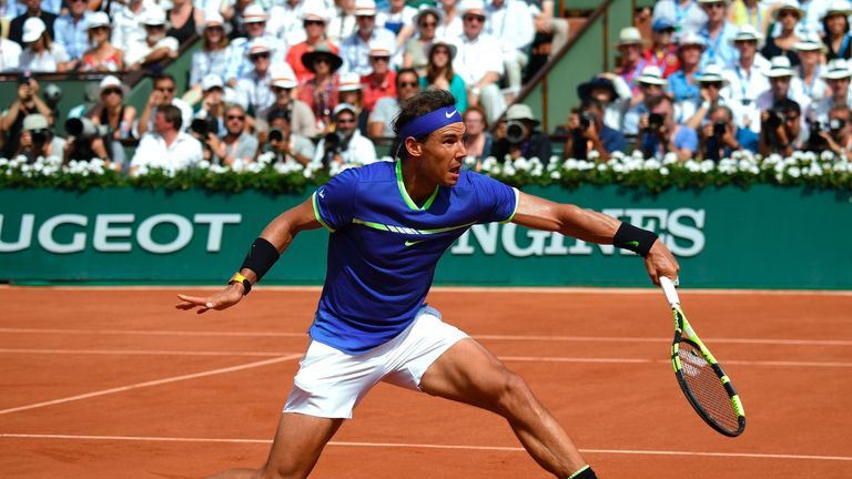 Spain's Rafael Nadal returns the ball to Switzerland's Stanislas Wawrinka during the men's final tennis match at the Roland Garros 2017 French Open on June
