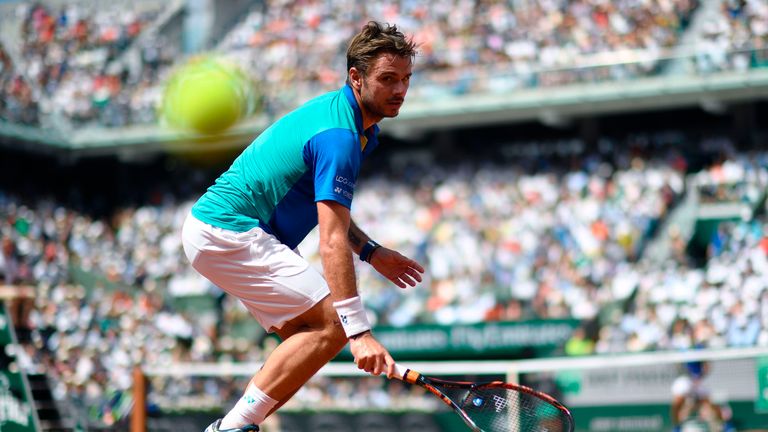 Switzerland's Stanislas Wawrinka fails to return the ball to Spain's Rafael Nadal during the men's final tennis match at the Roland Garros 2017 French Open
