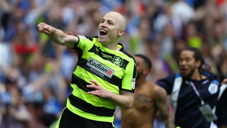 Aaron Mooy has joined Huddersfield Town on a permanent deal
