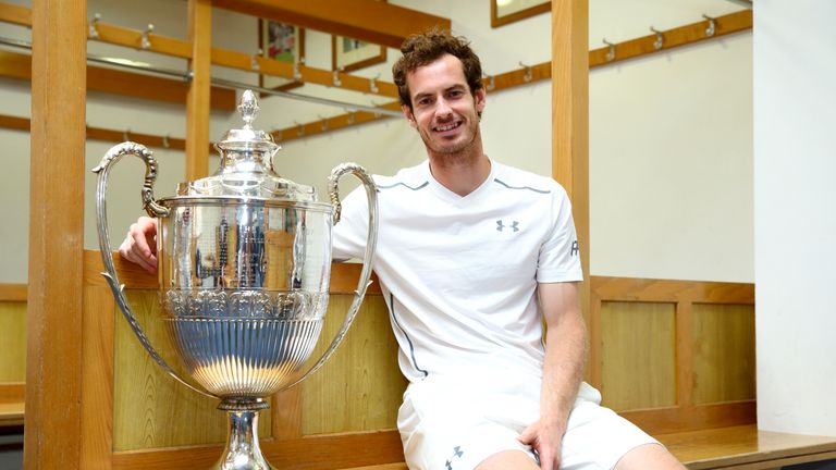 Andy Murray of Great Britain poses with the Aegon Championships trophy after winning his record breaking fifth title