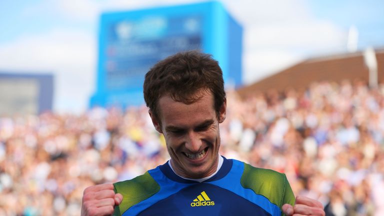 Andy Murray of Great Britain celebrates victory during the Men's Singles final against Marin Cilic of Croatia on day seven