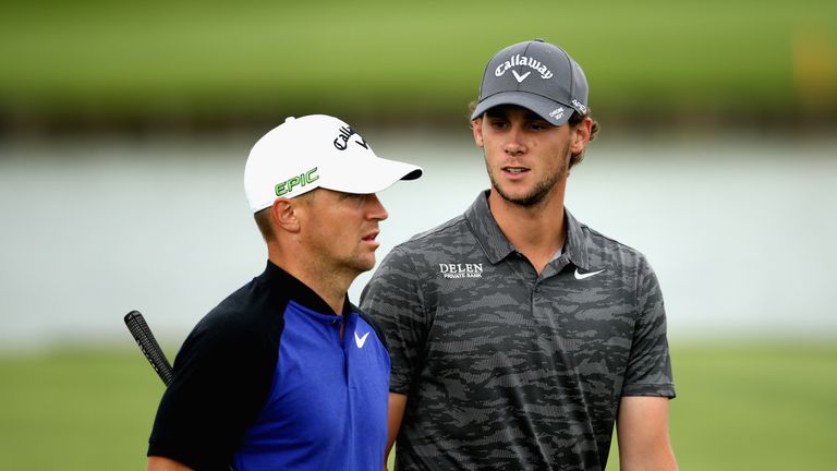 PARIS, FRANCE - JUNE 30:  Alex Noren of Sweden speaks with Thomas Pieters of Belgium during day two of the HNA Open de Feance at Le Golf National on June 3