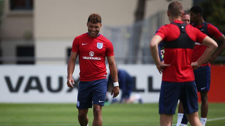 Alex Oxlade-Chamberlain looks on during England training session