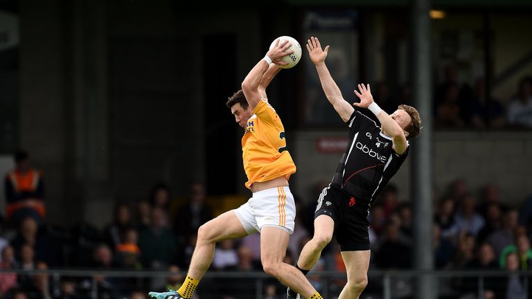 Conor Murray of Antrim in action against Charlie Harrison of Sligo 