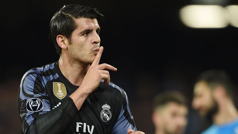 Real Madrid's forward Alvaro Morata celebrates after scoring at the end of the UEFA Champions League football match SSC Napoli vs Real Madrid on March 7, 2