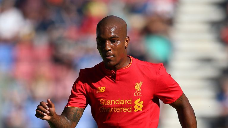 Andre Wisdom of Liverpool runs with the ball during a pre-season friendly between Wigan Athletic and Liverpool at JJB Stadium in July 2017