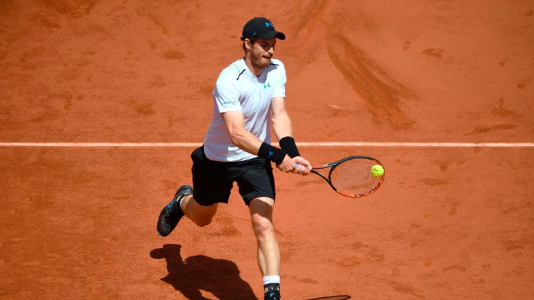 Britain's Andy Murray returns the ball to Switzerland's Stanislas Wawrinka during their semifinal tennis match at the Roland Garros 2017 French Open on Jun
