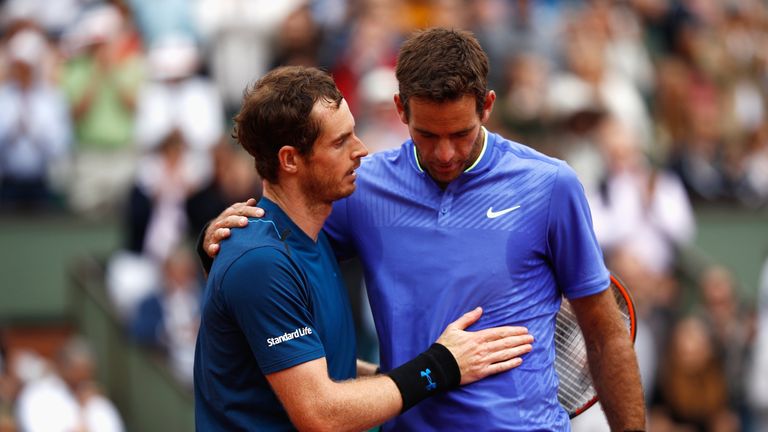 PARIS, FRANCE - JUNE 03:  Andy Murray of Great Britain and Juan Martin Del Potro of Argentina embrace after the men's singles third round match during day 