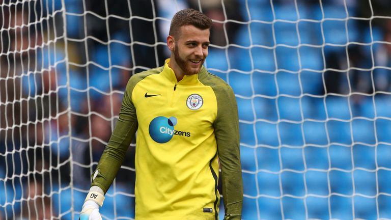 MANCHESTER, ENGLAND - MAY 06:  Angus Gunn of Manchester City warms up prior to the Premier League match between Manchester City and Crystal Palace at the E