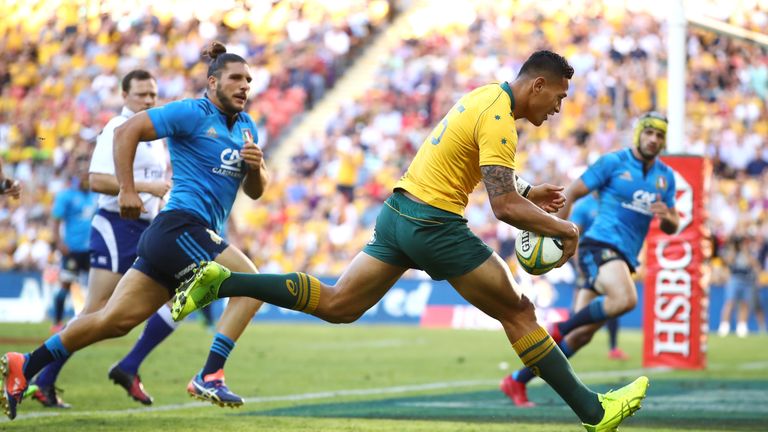 Israel Folau of the Wallabies scores a try