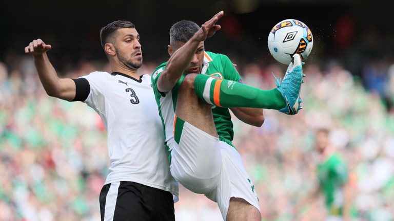 Austria's Aleksander Dragovic (left) and Republic of Ireland's Jonathan Walters compete during the 2018 FIFA World Cup Qualifying, Group D match