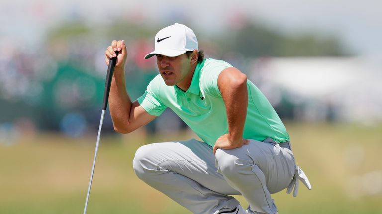 HARTFORD, WI - JUNE 18:  Brooks Koepka of the United States lines up a putt on the first green during the final round of the 2017 U.S. Open at Erin Hills o