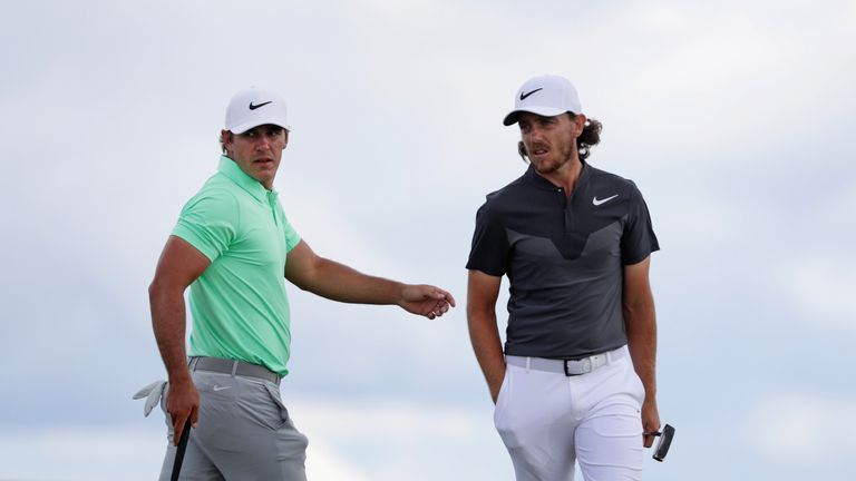 HARTFORD, WI - JUNE 18:  Brooks Koepka of the United States (L) and Tommy Fleetwood of England walk across the eighth green during the final round of the 2
