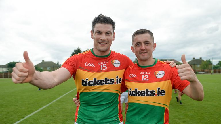 John Murphy and Alan Kelly of Carlow celebrate following their side's victory during the GAA Football All-Ireland match between London and Carlow