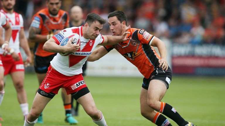 Jake Webster of Castleford Tigers and Ryan Morgan of St Helens