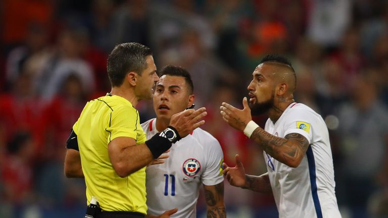 Arturo Vidal of Chile appeals to referee Damir Skomina after Chile's goal was disallowed 