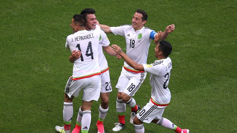 Mexico's forward Hirving Lozano (2nd L) celebrates a second goal during the 2017 Confederations Cup group A football match between Mexico and Russia at the