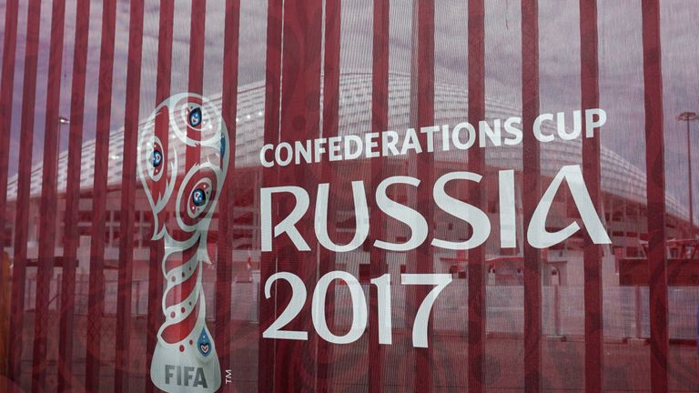 The Fisht stadium is seen behind a Russia 2017 Confederations Cup logo in Sochi on June 18, 2017. / AFP PHOTO / PATRIK STOLLARZ        (Photo credit should