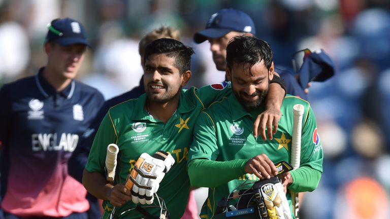 Pakistan's Babar Azam and Mohammad Hafeez celebrate victory v England after the ICC Champions Trophy, semi-final match at the Cardiff Wales Stadium