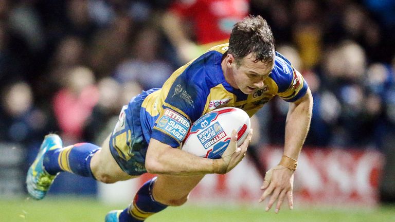 Leeds Rhinos' Danny McGuire scores a try during the Super League match at Headingley Stadium, Leeds.