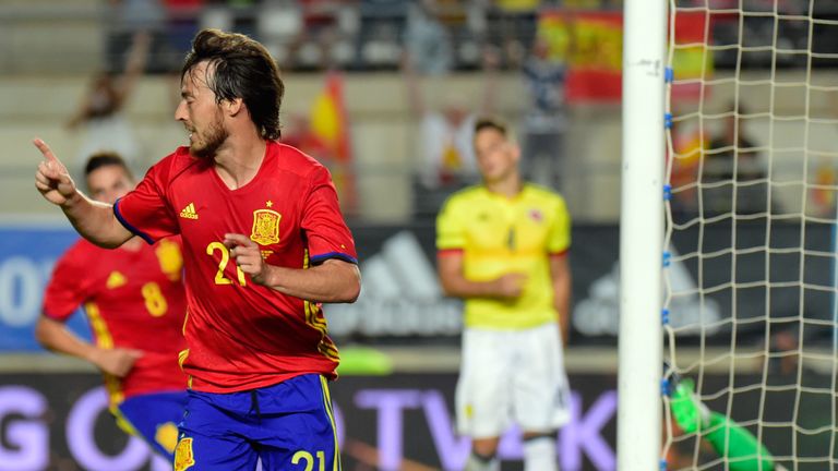 Spain's midfielder David Silva celebrates a goal during the friendly international football match Spain vs Colombia at the Condomina stadium in Murcia on J