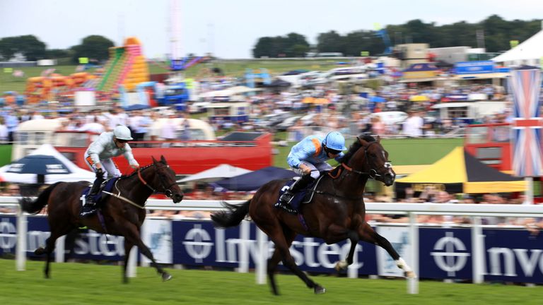 De Bruyne Horse on the way to winning the Investec Woodcote Stakes from Cardsharp
