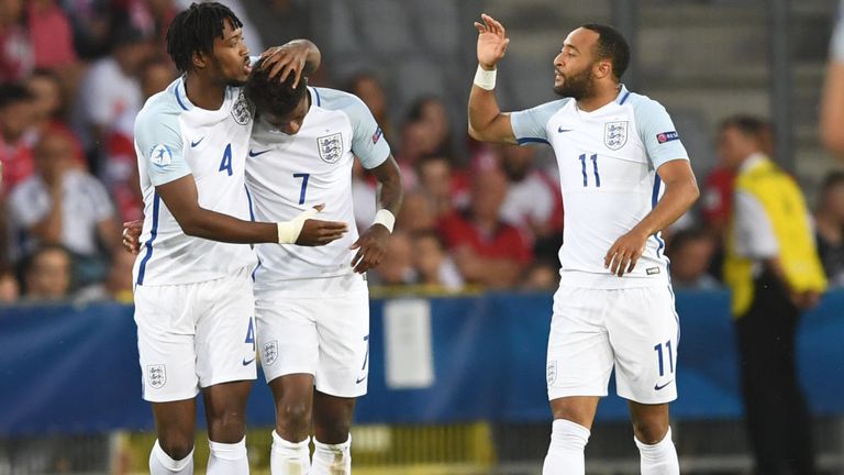 England's midfielder Demaray Grey (C) celebrate scoring the opening goal w