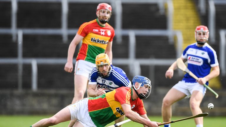 Diarmuid Byrne of Carlow in action against Cahir Healy of Laois during the GAA Hurling All-Ireland Senior Championship Preliminary Round match