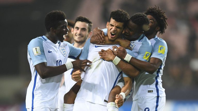 England's forward Dominic Solanke (#10) celebrates his goal with teammates during the U-20 World Cup semi-final football match between England and Italy in