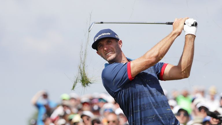 Dustin Johnson plays his shot on the 17th hole during the first round of the 2017 U.S. Open