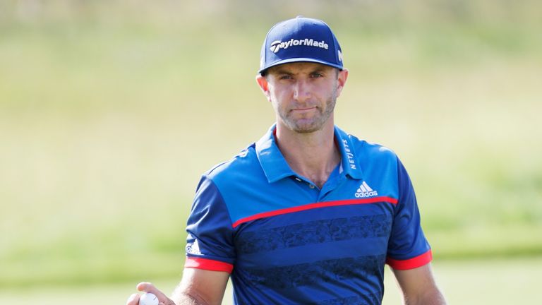 HARTFORD, WI - JUNE 15:  Dustin Johnson of the United States reacts after making par on the 11th green during the first round of the 2017 U.S. Open at Erin