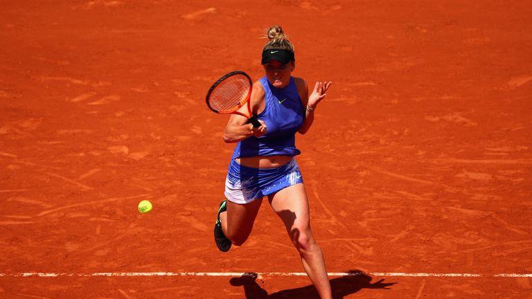 PARIS, FRANCE - JUNE 07:  Elina Svitolina of Ukraine plays a forehand during ladies singles quarter finals match against Simona Halep of Romania on day ele