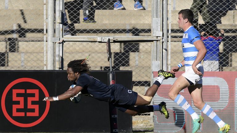 England's wing Marland Yarde dives over for his side's opening try