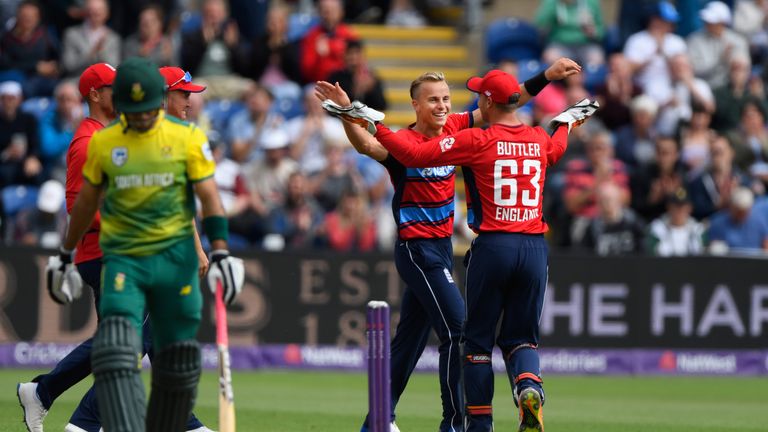 CARDIFF, WALES - JUNE 25: Tom Curran celebrates the first wicket with Jos Buttler of South Africa batsman Reeza Hendricks during the 3rd NatWest T20 Intern