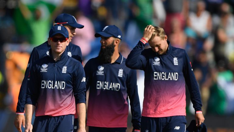 England captain Eoin Morgan leaves the field with his team after the ICC Champions Trophy semi final between England and Pakistan