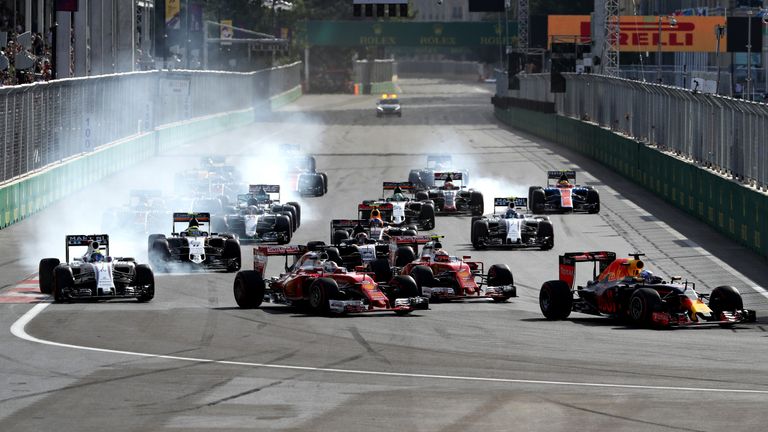 BAKU, AZERBAIJAN - JUNE 19: Daniel Ricciardo of Australia driving the (3) Red Bull Racing Red Bull-TAG Heuer RB12 TAG Heuer leads Sebastian Vettel of Germa