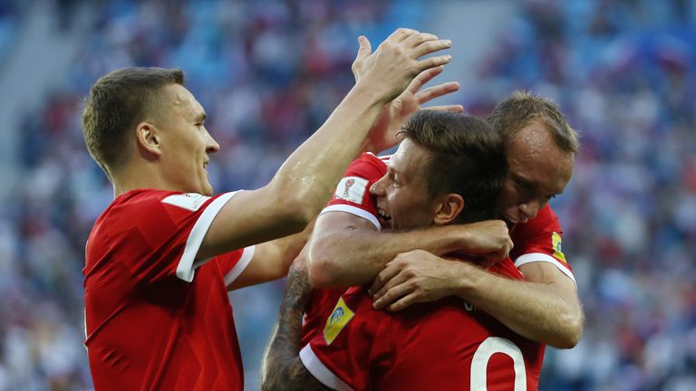 Fedor Smolov celebrates scoring Russia's second goal.