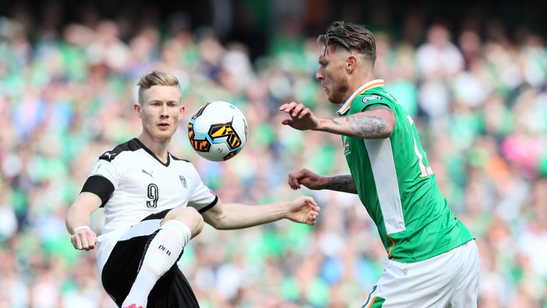 Austria's Florian Kainz (left) and Republic of Ireland's Jeff Hendrick battle for the ball during the 2018 FIFA World Cup Qualifying, Group D match, Dublin