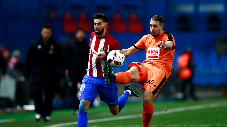 MADRID, SPAIN - JANUARY 19: Yannick Carrasco (L) of Atletico de Madrid competes for the ball with Florian Lejeune (R) of SD Eibar during the Copa del Rey q