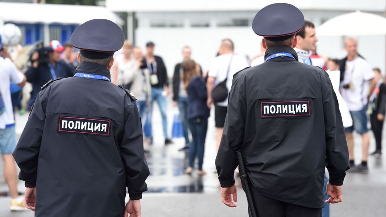 Russian police patrol the area as fans arrive for the start of the 2017 Confederations Cup group B football match between Australia and Germany at the Fish